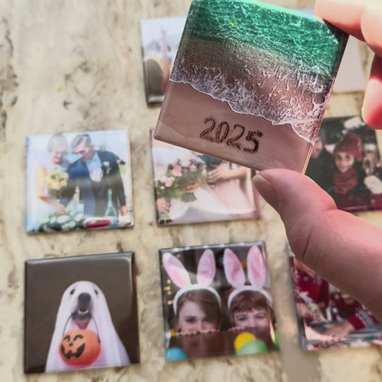 Video shows multiple 2x2 inch square photo magnets with various photos including pets, nature and family
