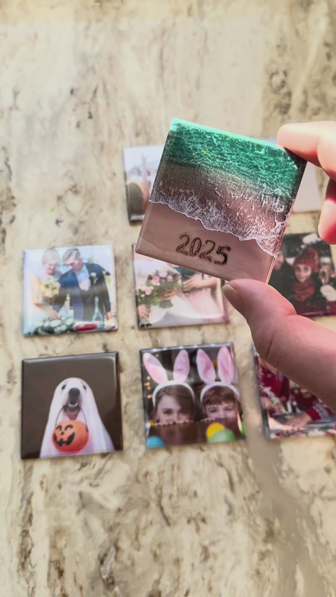 Video shows multiple 2x2 inch square photo magnets with various photos including pets, nature and family